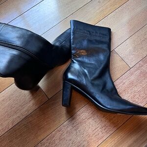 Sleek Black Leather Heeled Boots